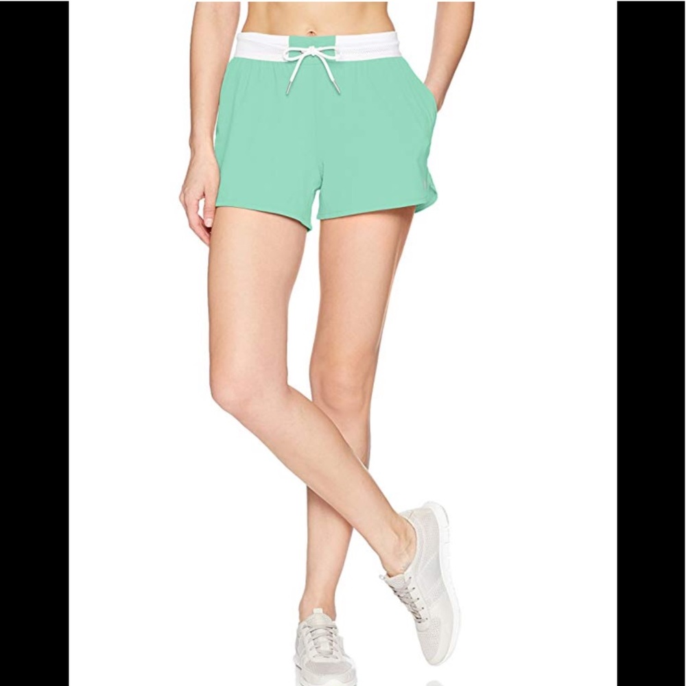 ASICS women’s green athletic shorts workout run